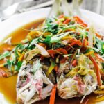 steamed fish with veggies and sauce