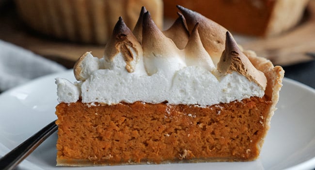 sliced sweet potato pie with marshmallow meringue