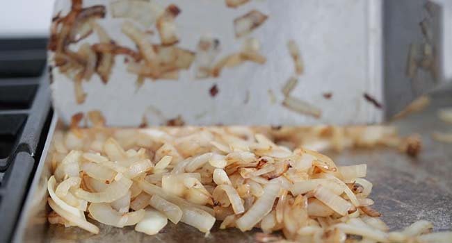 browning onions on a griddle