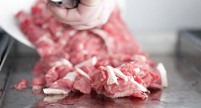 cooking steak on a griddle