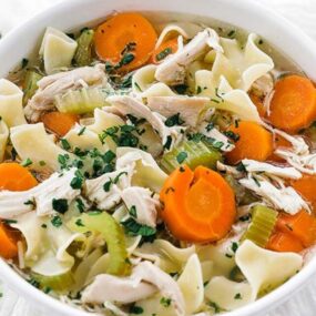 bowl of chicken noodle soup with vegetables