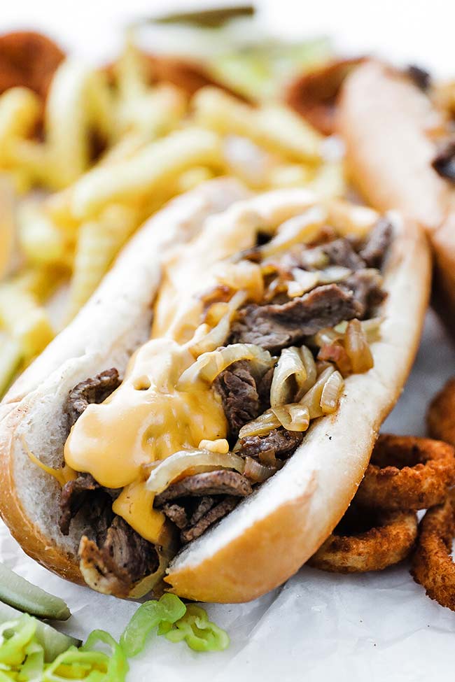 cheesesteak sandwich with fries