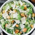 bowl of caesar salad with croutons