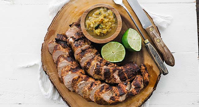 sliced pork tenderloin with pineapple salsa.