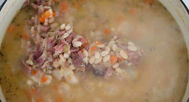 finished ham and bean soup with a ham hock