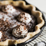 chocolate chess pie in a cast iron pan