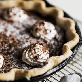 chocolate chess pie in a cast iron pan