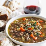 beef and barley soup in a bowl