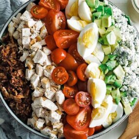 cobb salad with chicken and bacon in a bowl