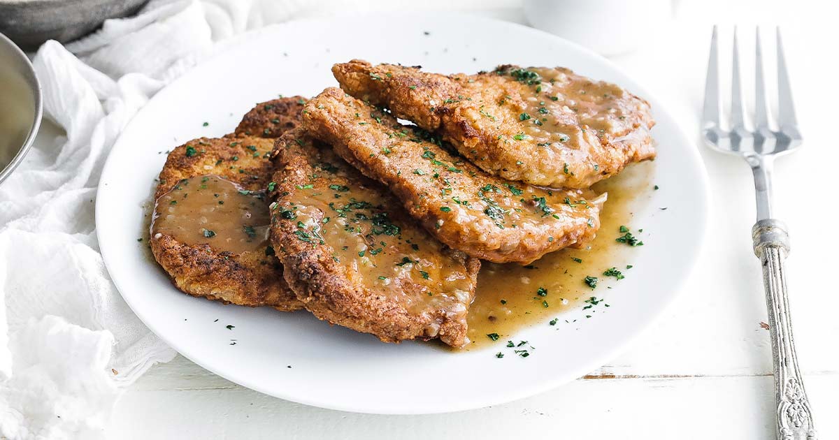 Smothered Pork Chops Recipe - Chef Billy Parisi