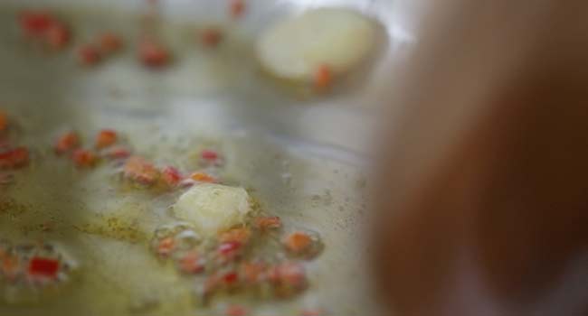 peppers and garlic cooking