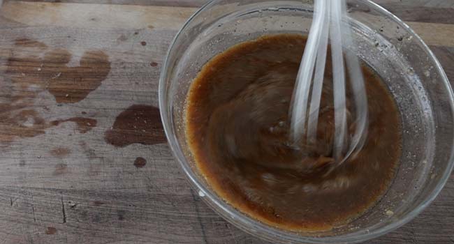 whisking a marinade