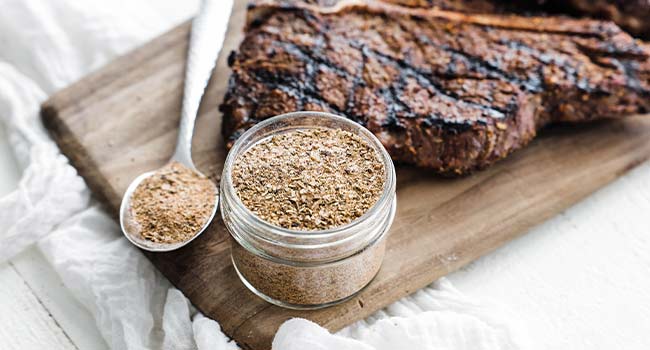 homemade steak seasoning with a grilled steak