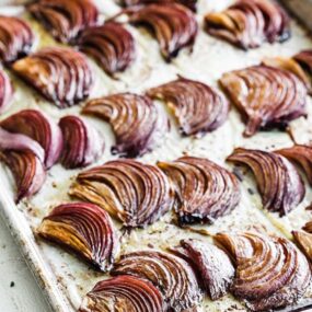 balsamic onions on a sheet tray