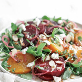 beet salad with greens on a plate