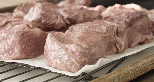 patting beef dry with paper towels