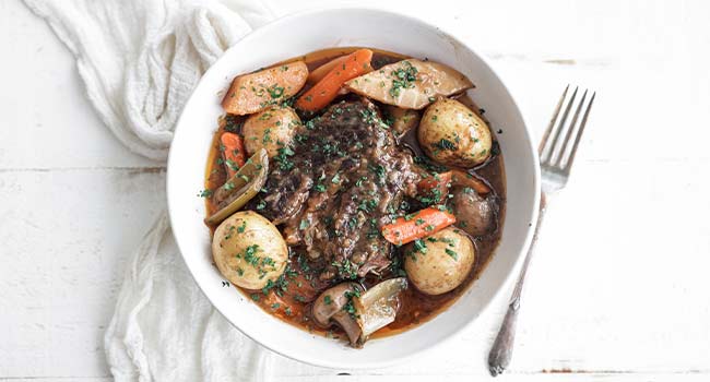 pot roast with veggies in a bowl