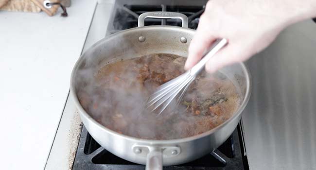 whisking a beef gravy