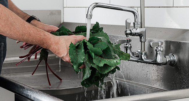 washing beet greens