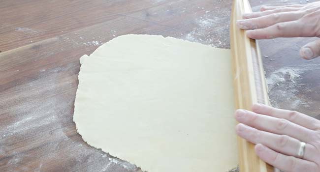 rolling out dough with a pin