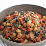 ratatouille in a bowl with thyme