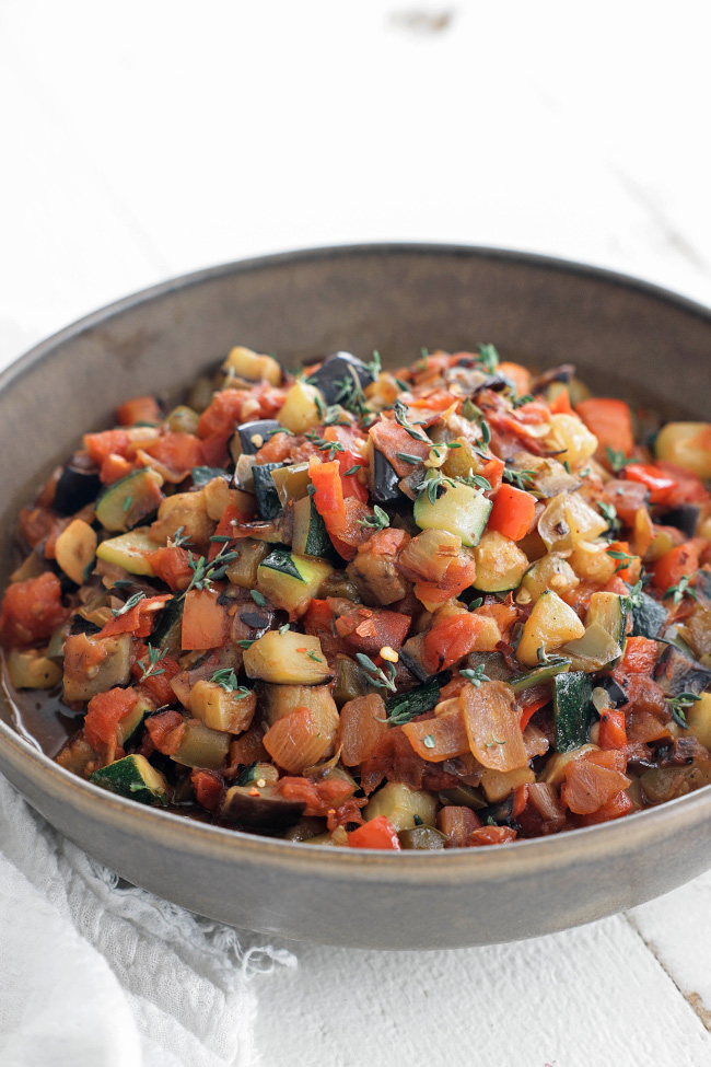 ratatouille in a bowl with thyme