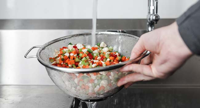 rinsing vegetables