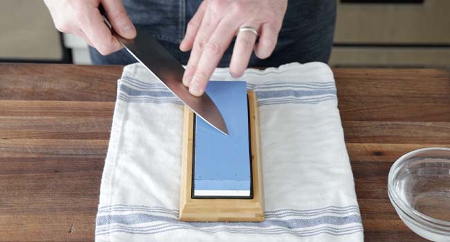 sharpening the tip of a knife