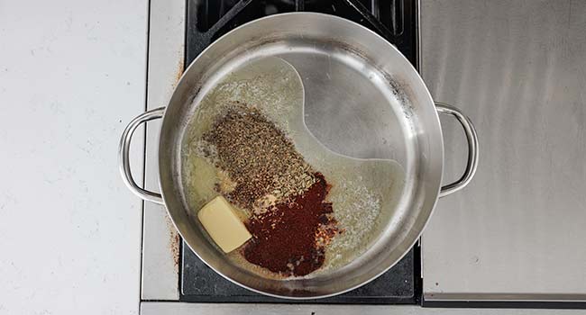 butter and spices in a pot