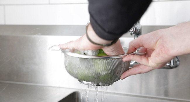 rinsing tomatillos