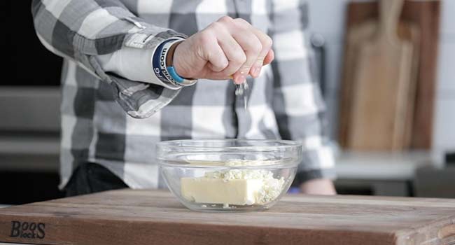 adding lemon to butter