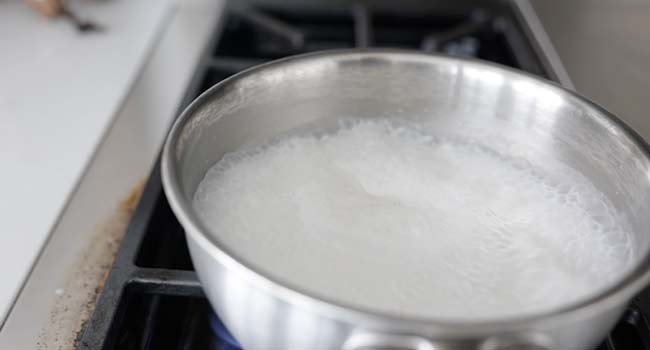 boiling coconut milk and water