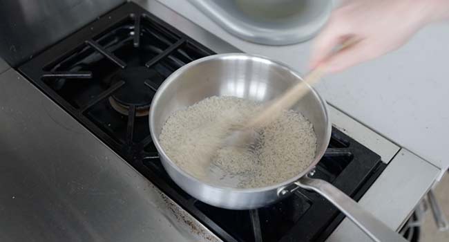 toasting rice in a pot