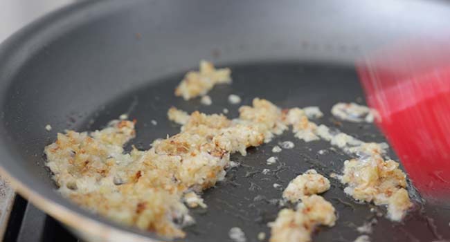 browned garlic and shallots in a pan