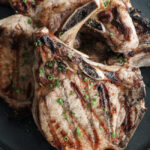 grilled pork chops on a plate