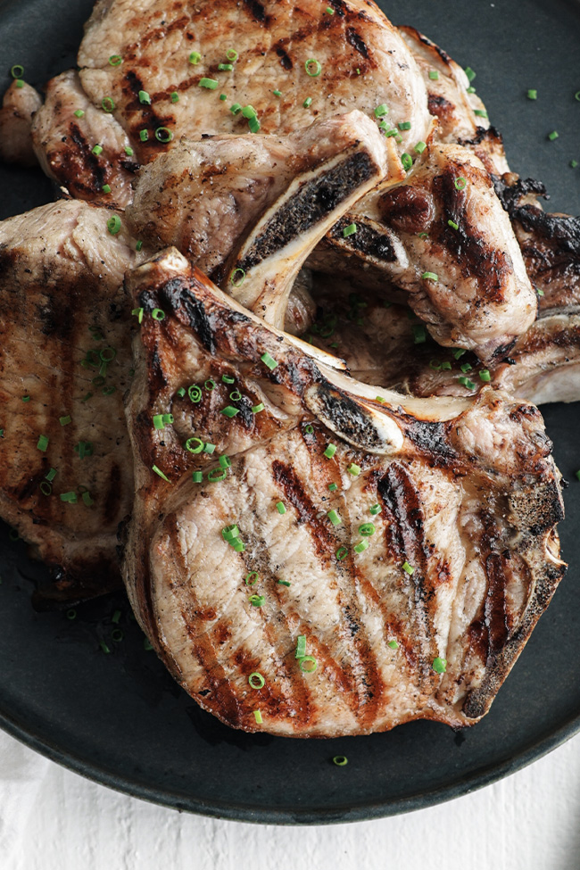 grilled pork chops on a plate