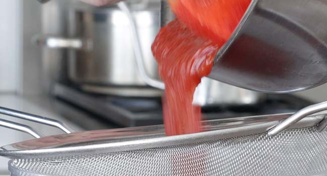 straining ketchup