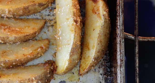 flipping potato wedges over