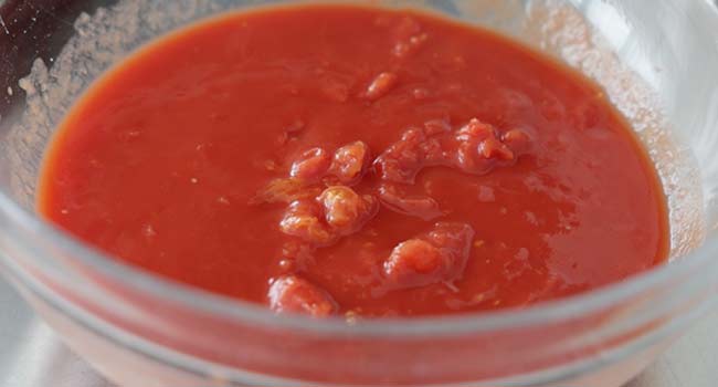 crushed tomatoes in a bowl