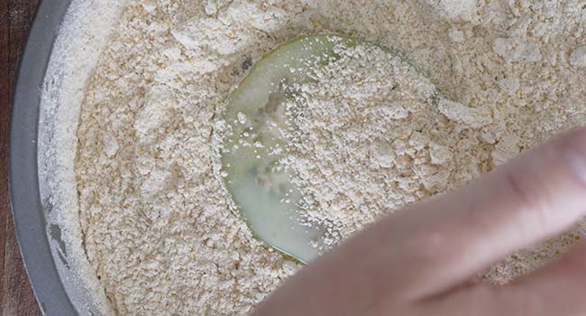 coating tomatoes in breading