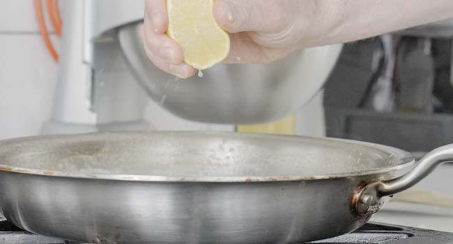 adding lemon juice to a pan