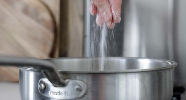 seasoning a liquid in a pot