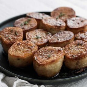 fondant potatoes on a plate