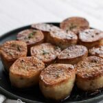 fondant potatoes on a plate