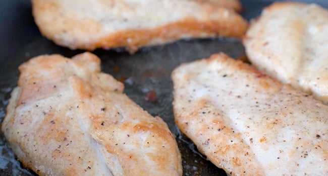 browned chicken in a pan