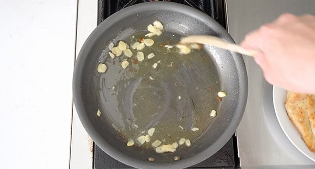 cooking garlic in a pan