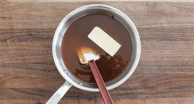 adding butter to bbq sauce