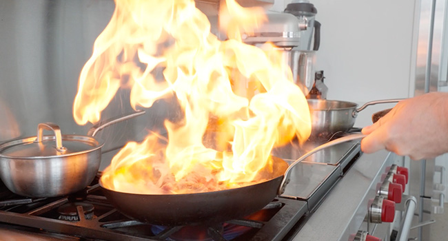 stir-frying with flames