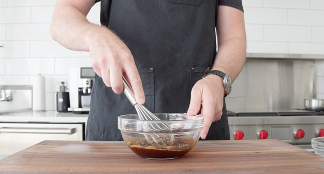 mixing soy and beef stock