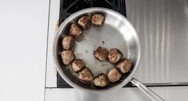 searing meatballs on all sides